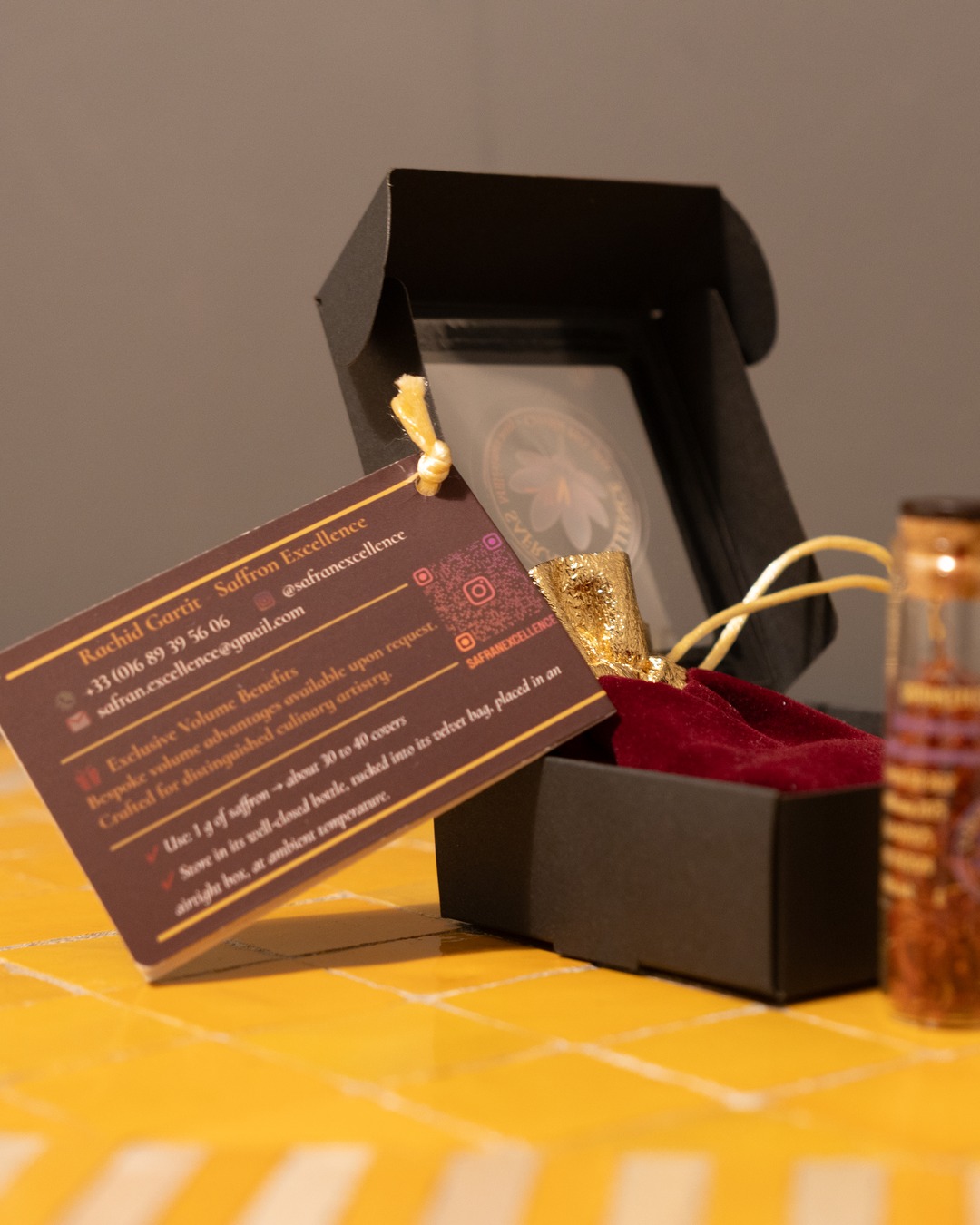 The Chef's Evaluation Pack: black box, velvet bag, bottle and card on zellige